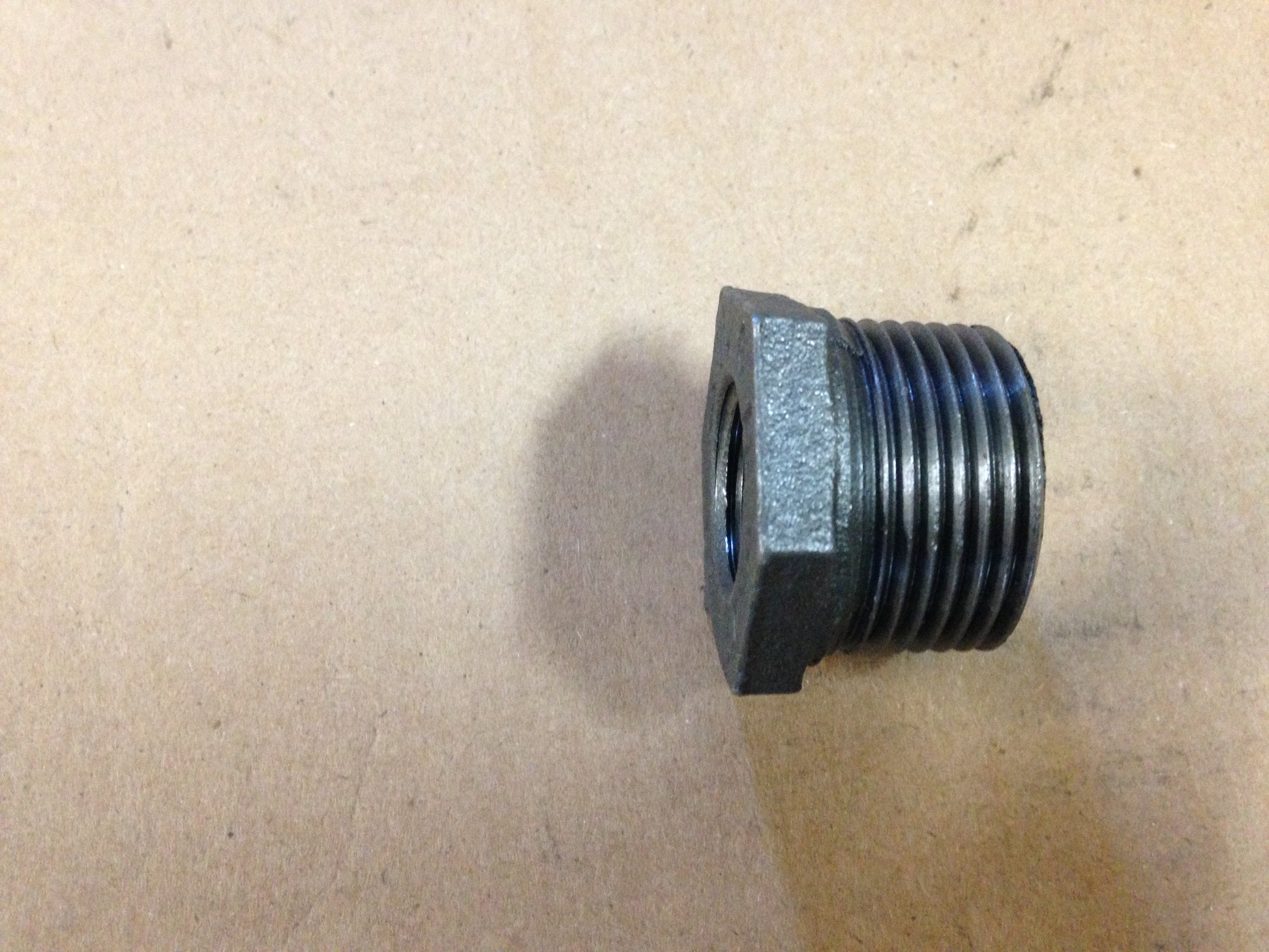 1" X 1/2" HEX BLACK BUSHING