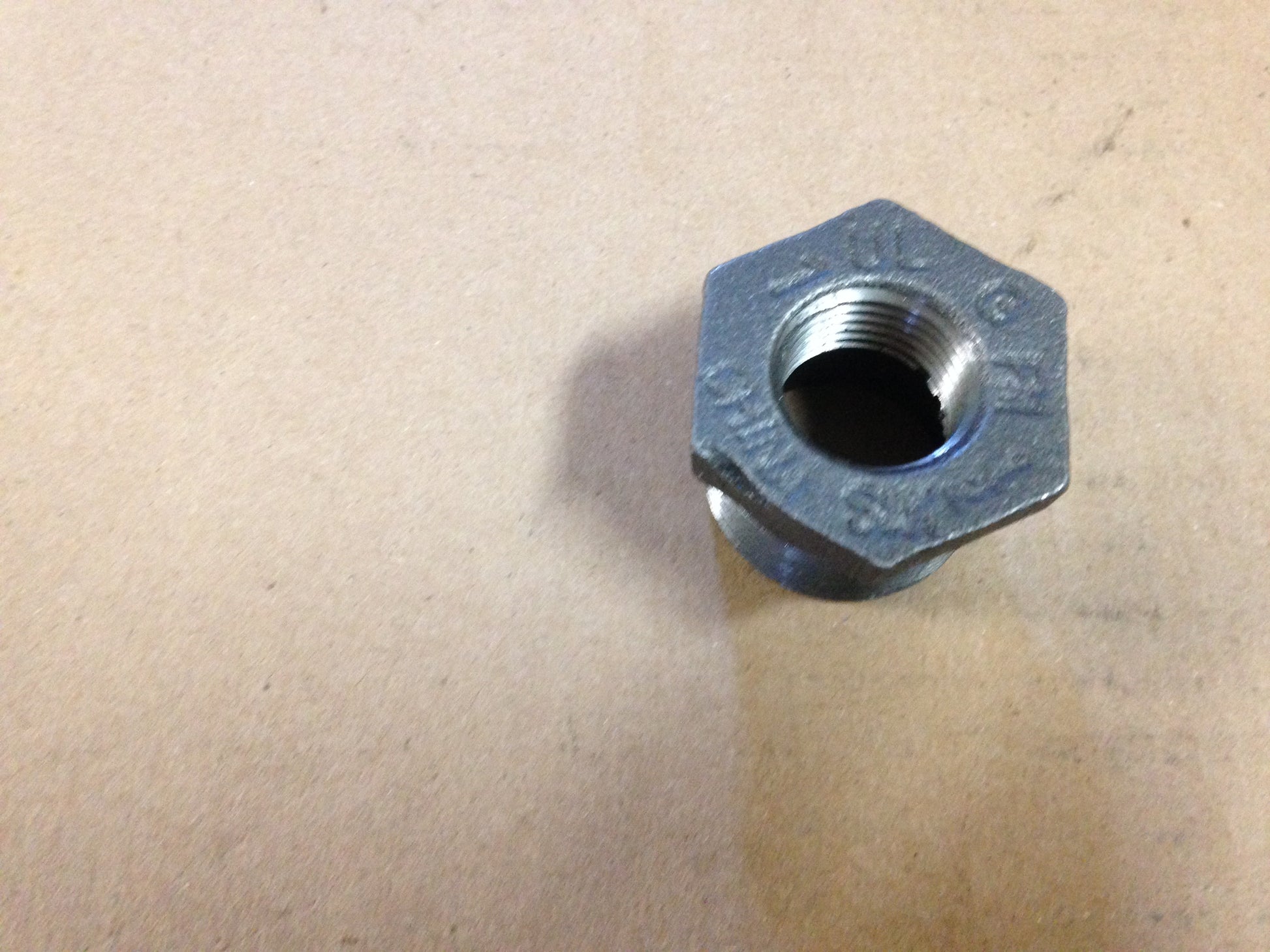 1" X 1/2" HEX BLACK BUSHING